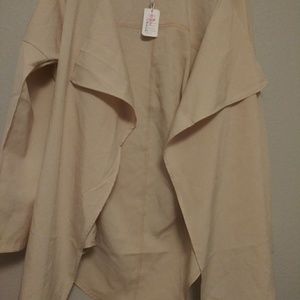 Cream colored long open front blazer